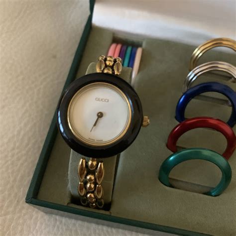 gucci watch changeable bezels